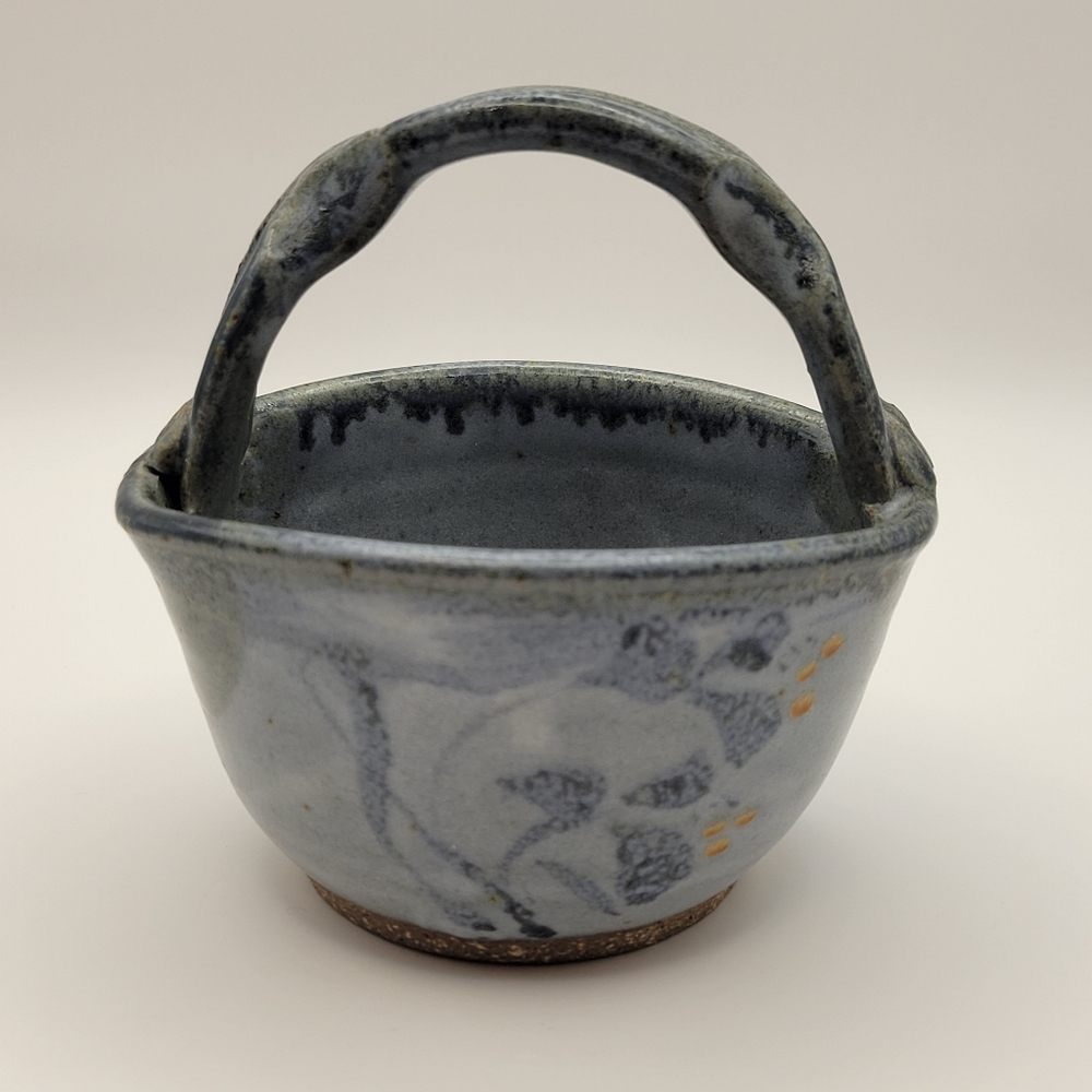 Art Pottery Basket. hand made with applied handle. Signed